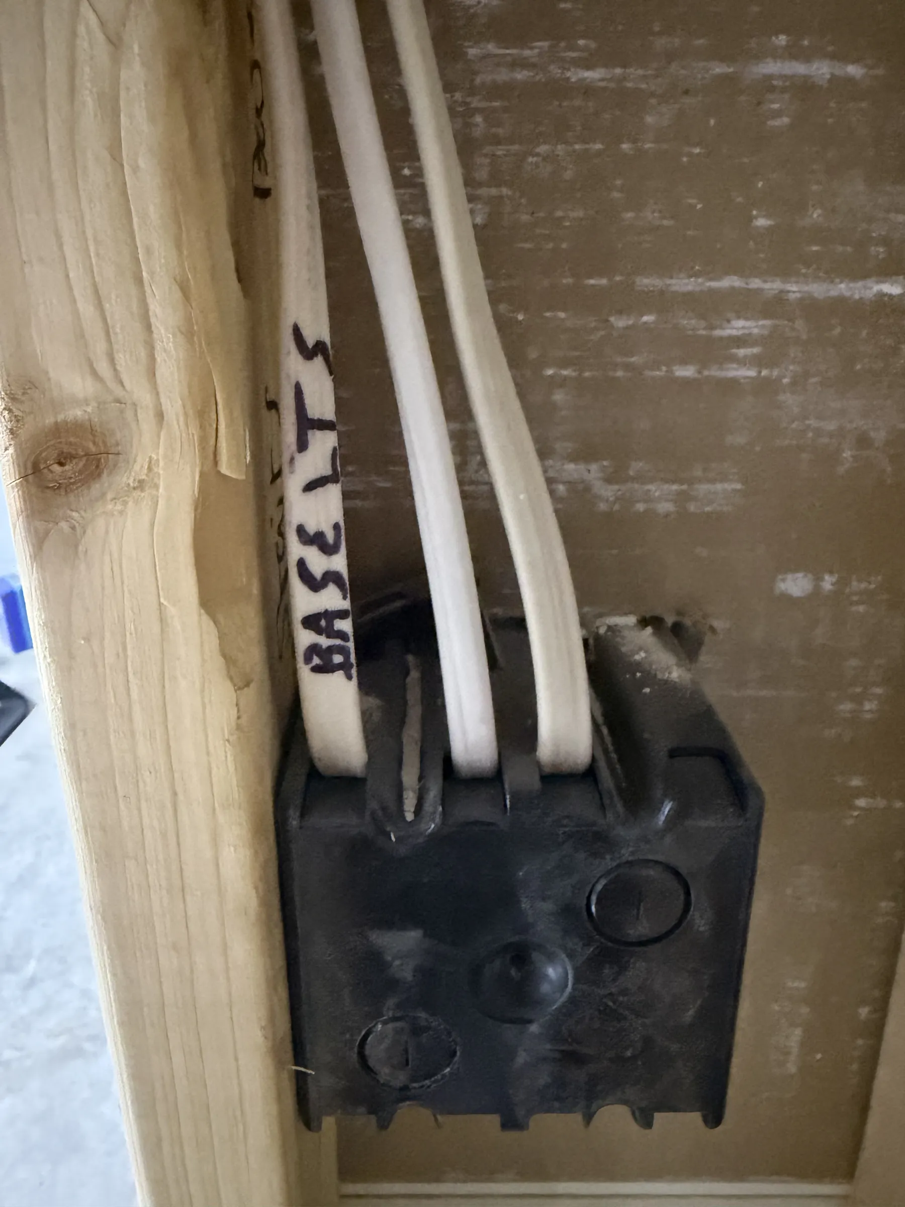 Back of the same switch. Wire labelled \"BASE LTS\" goes to the overhead gym light.