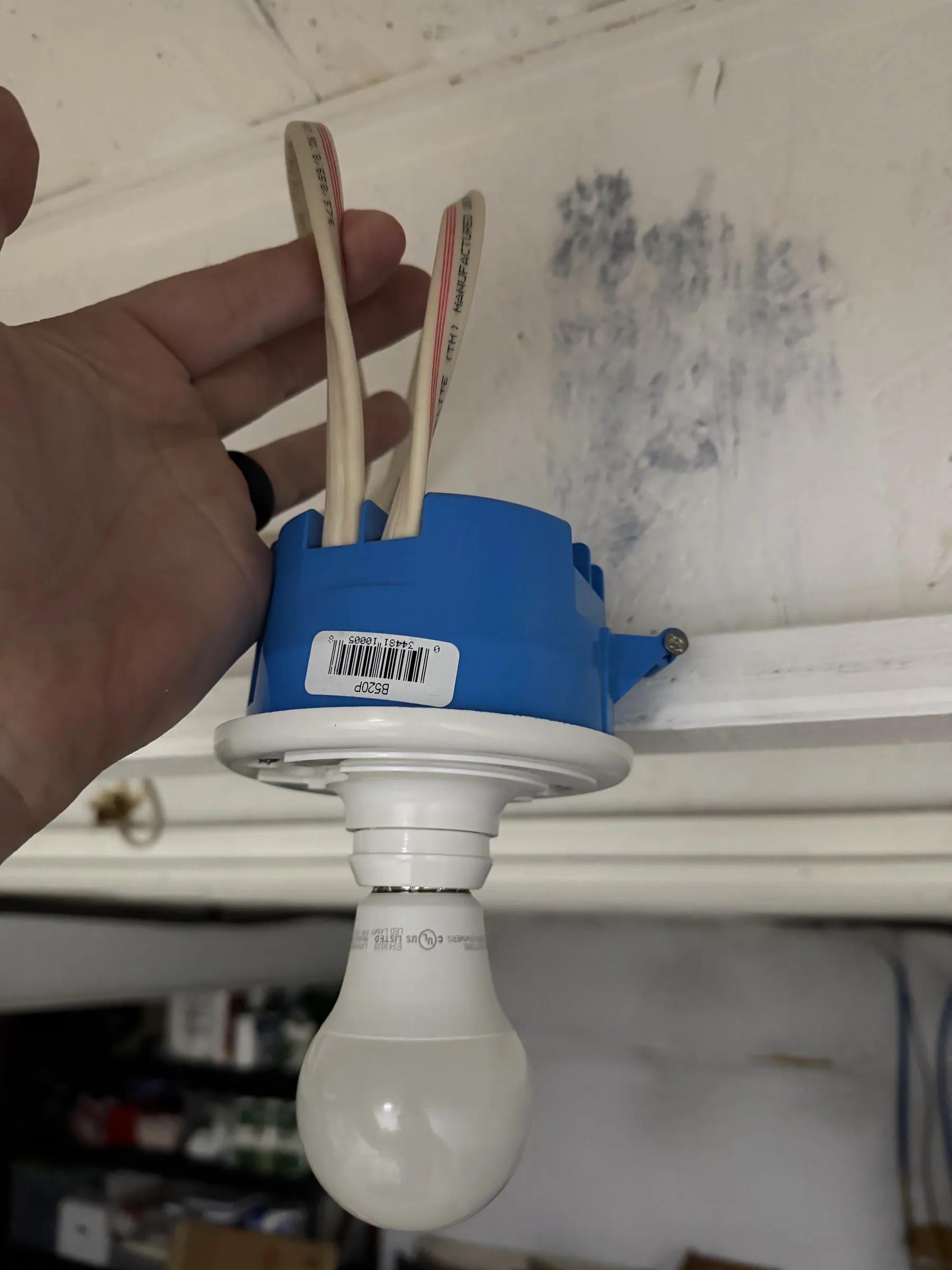 Light #1, the wire in my hand is the wire to the overhead gym light. The other wire goes to light #2.