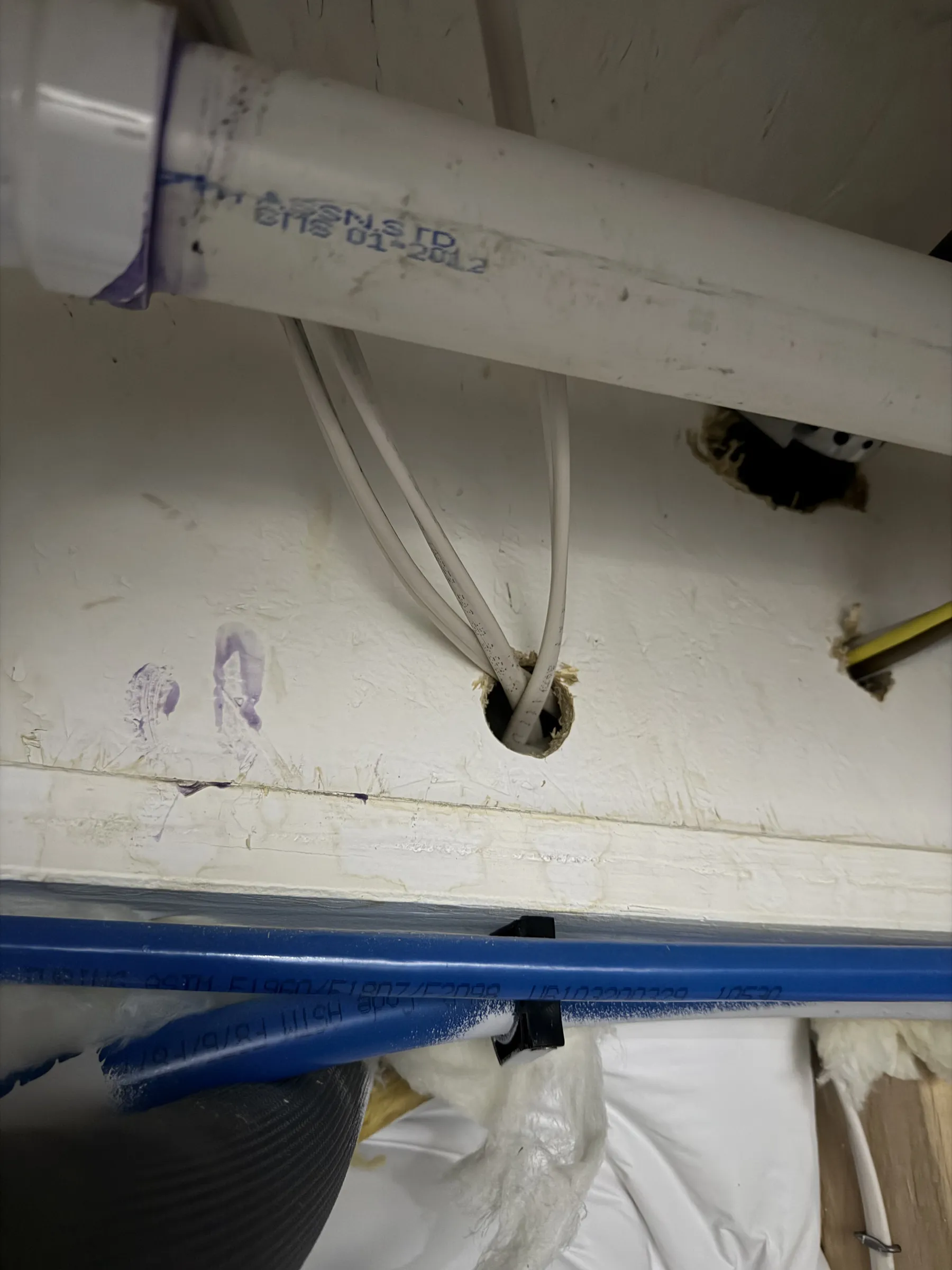 The south wall of our basement, where the wire from Light #2 goes. This probably goes to our box based on location? OR?