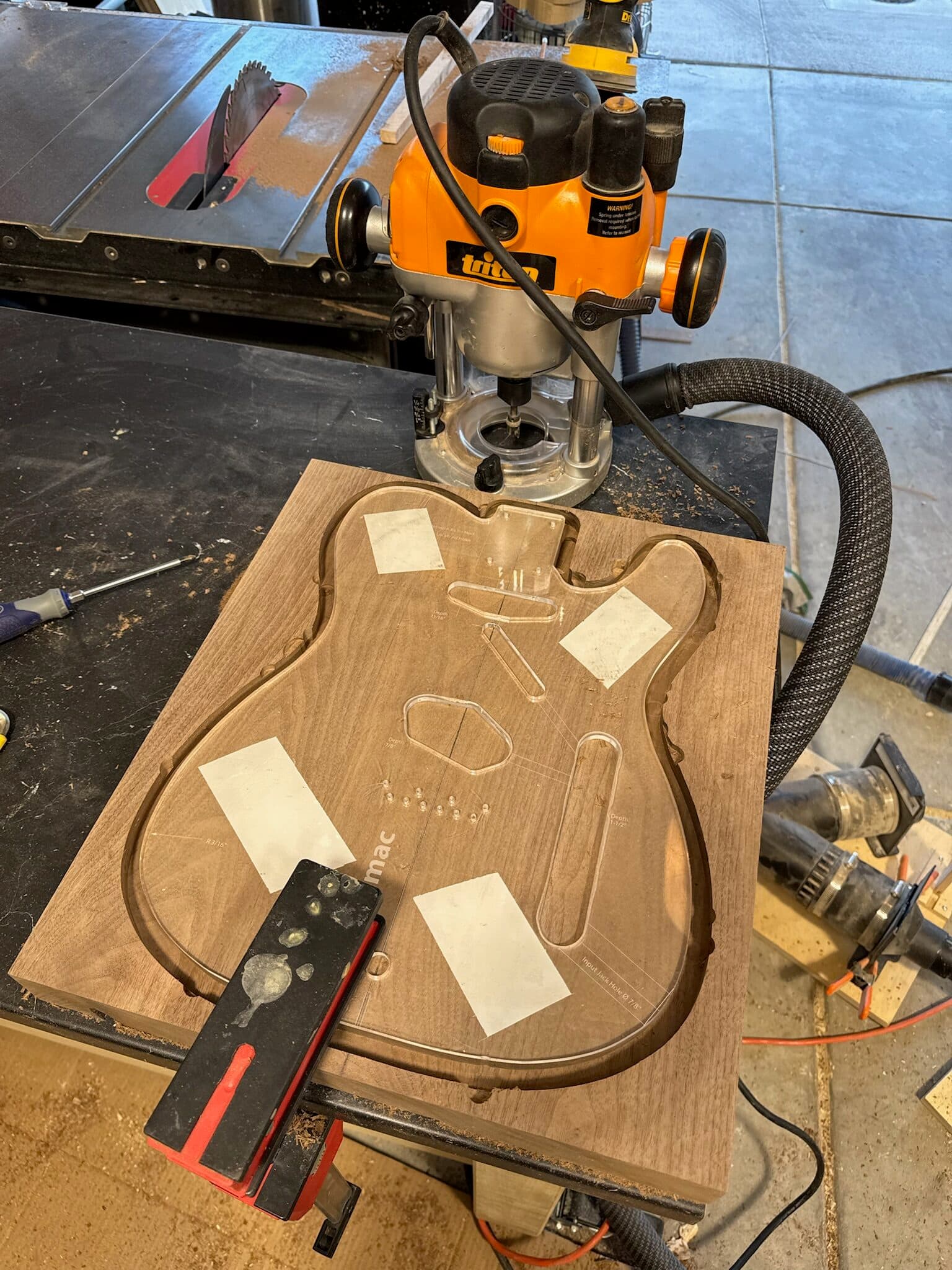 Routing star-shaped inlay pockets in the guitar body
