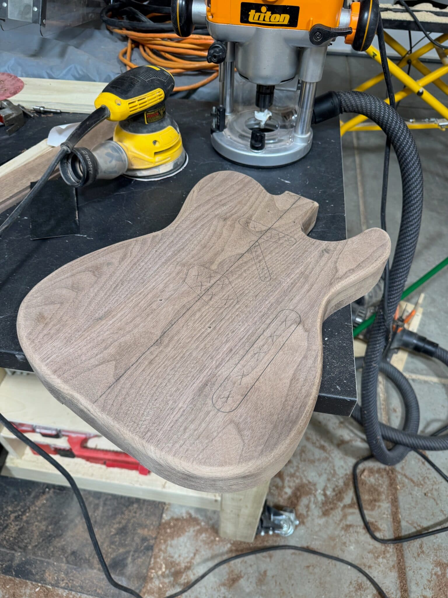 Shaped walnut Telecaster body before sanding