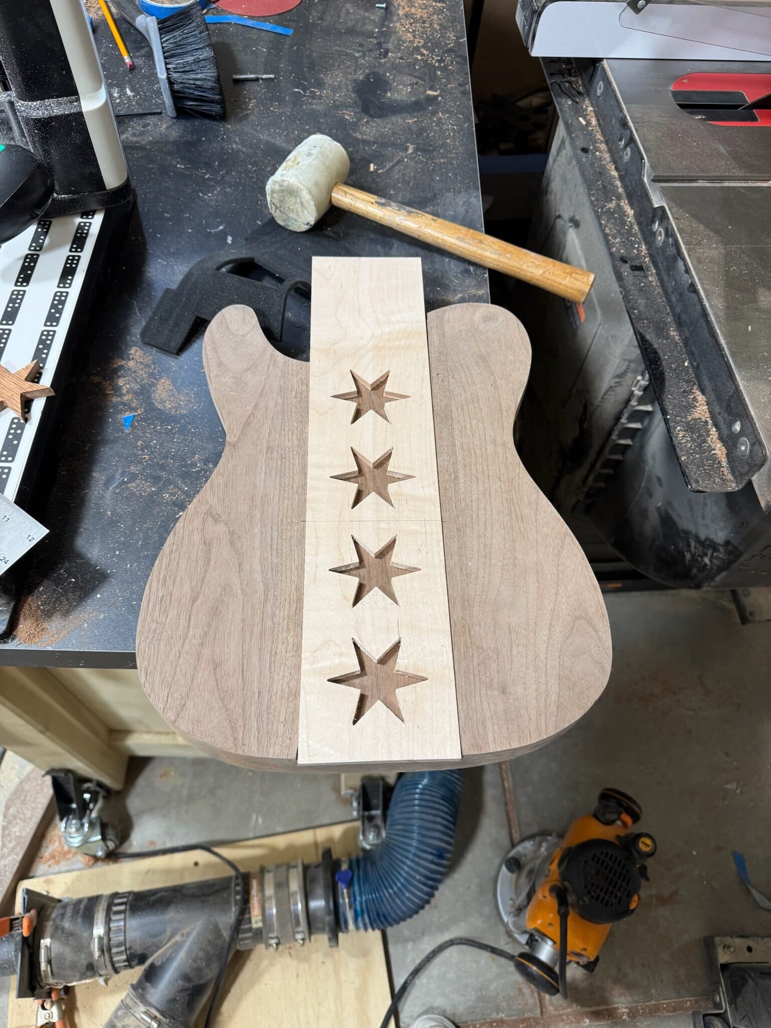 Bubinga stars set into the maple back stripe